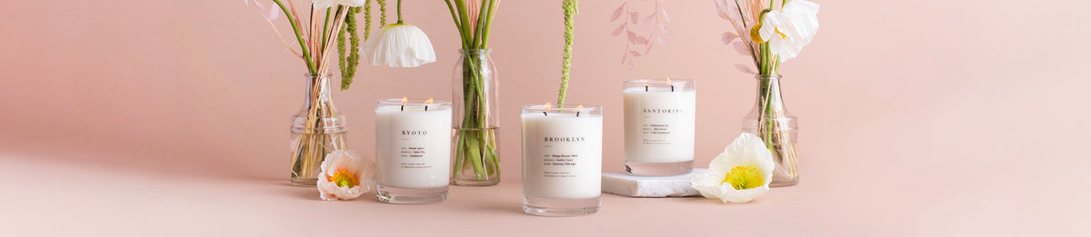 Kyoto, Brooklyn, Santorini Candle on pink background